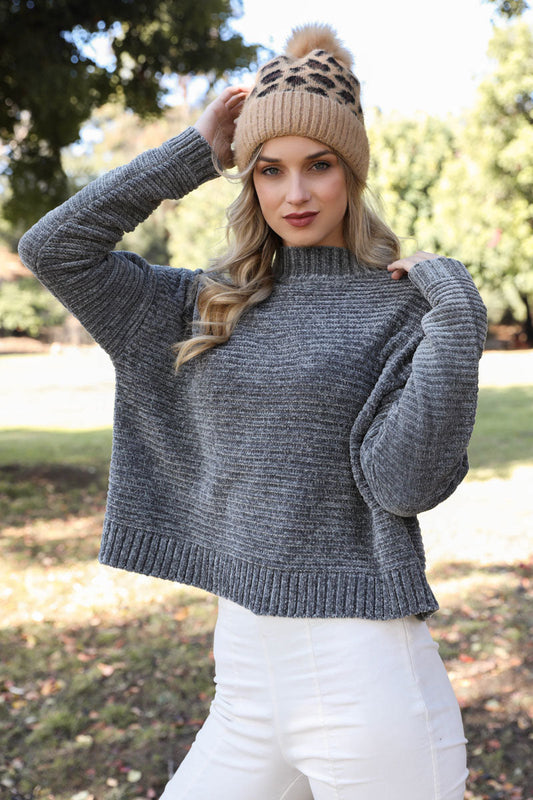 Leto Collection leopard knit beanie hat with warm, cozy camel and gray tones, perfect for stylish winter accessories.