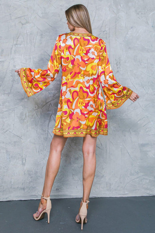 Caught Feelings Woven Mini Dress with V Neck Tie Tassel and Bell Sleeves — Soul Flow Apparel