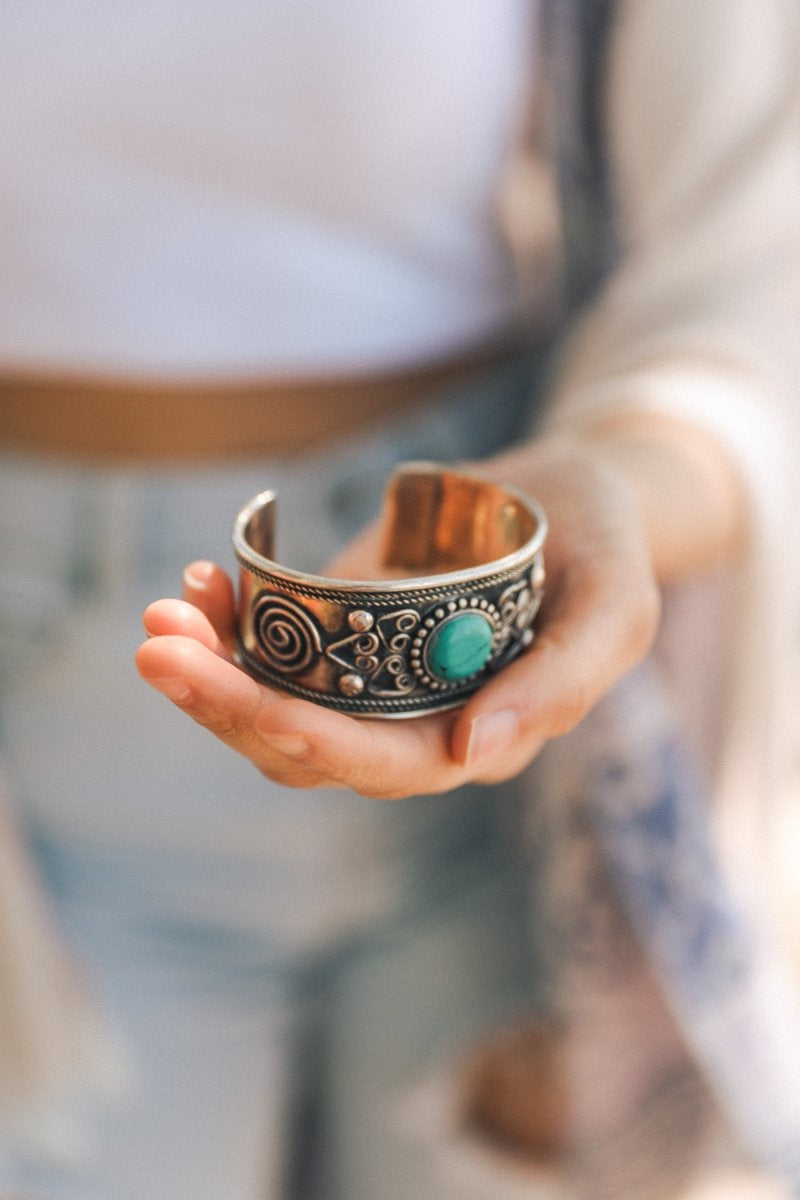 Leto Collection bohemian turquoise stone bangle with intricate silver detailing, stylish jewelry accessory.