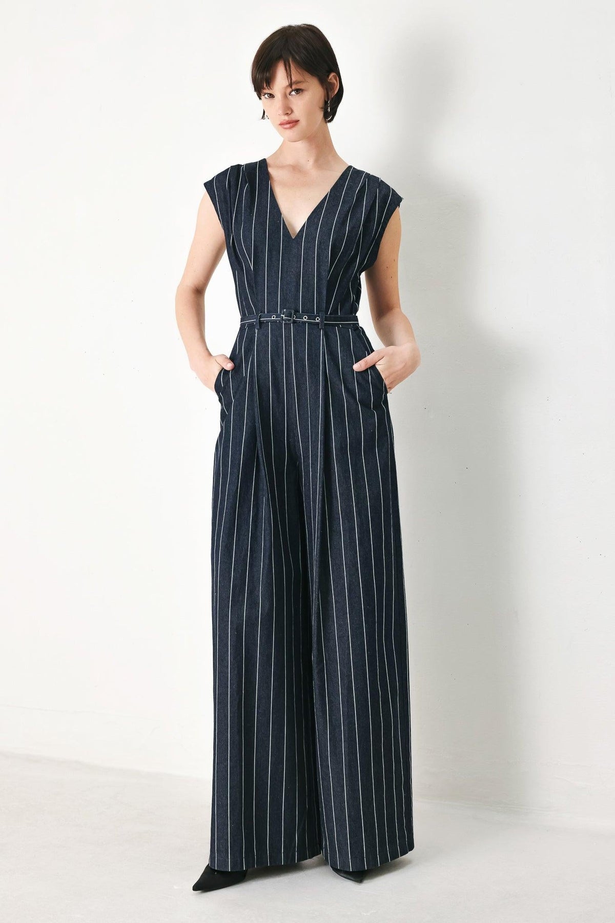 Soft Line Romance Woven Jumpsuit in dark denim, view 1 — Soul Flow Apparel