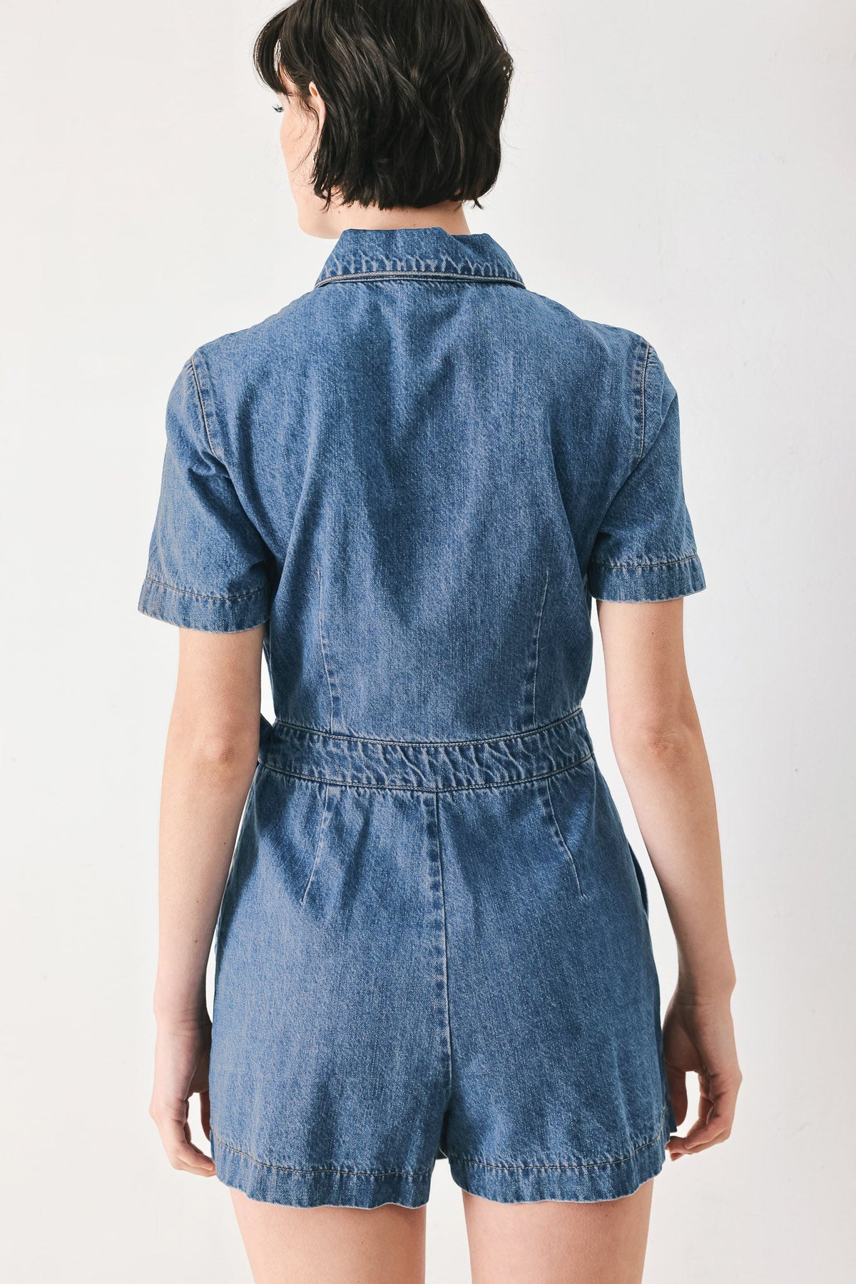 Daily Romance Denim Skort Romper in medium denim, view 6 — Soul Flow Apparel
