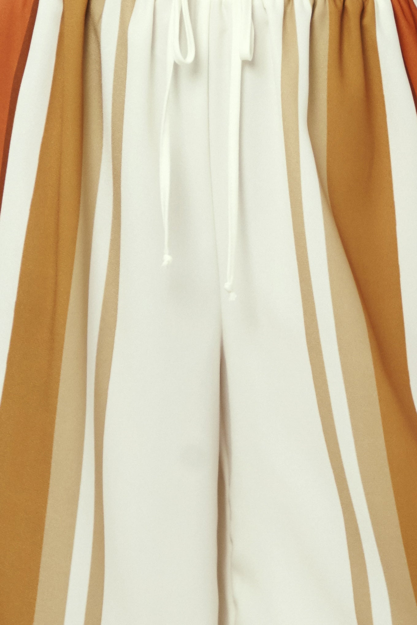 Golden Horizon Woven Pants in ivory rust, fabric swatch — Soul Flow Apparel