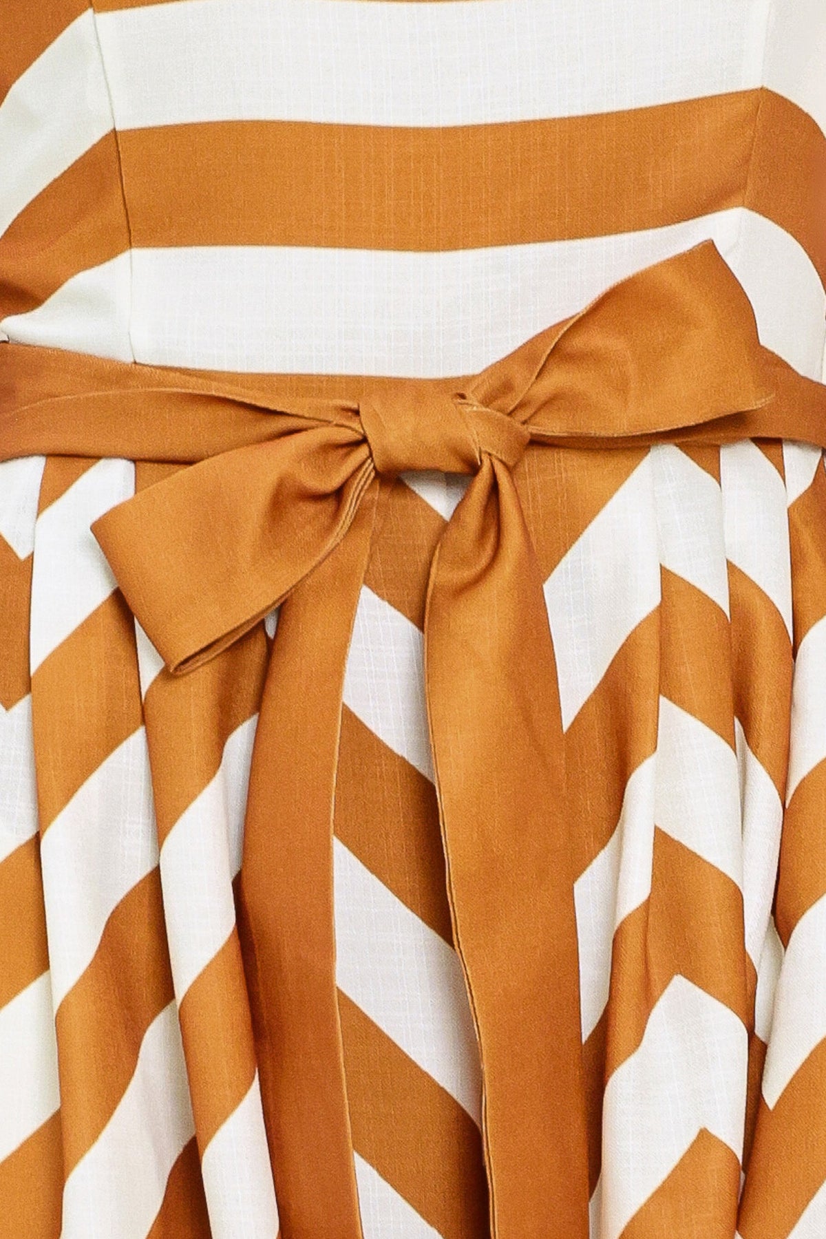 Cinnamon Coast Woven Jumpsuit in camel stripe, fabric swatch — Soul Flow Apparel
