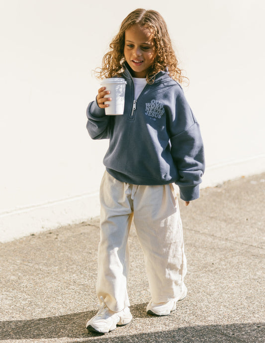 Our World Needs Jesus Kids Half-Zip – Christian Kids Jacket