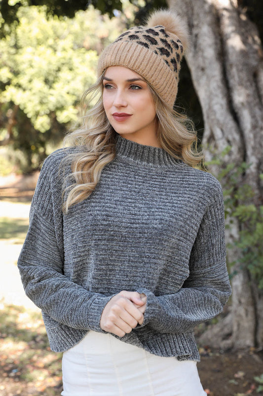 Leopard knit beanie hat from Leto Collection with camel and brown animal print, cozy and stylish winter accessory.