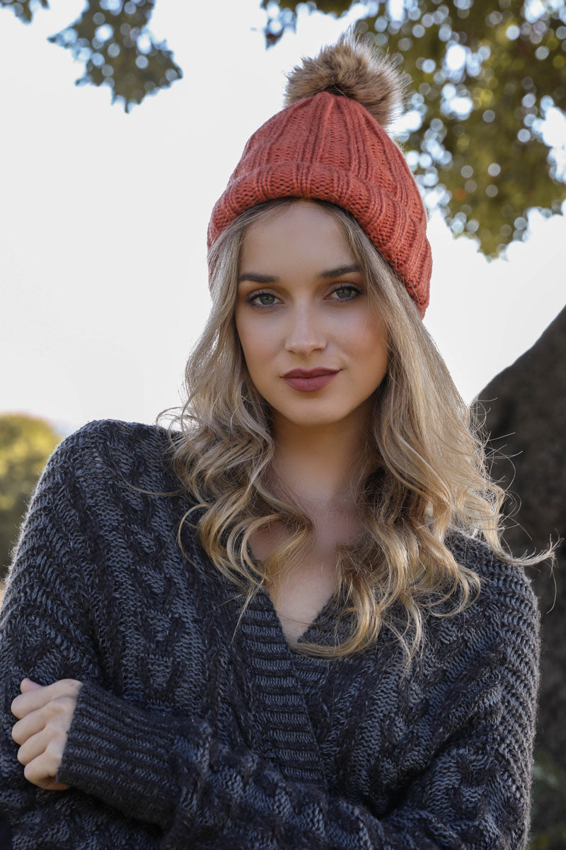 Leto Collection basic ribbed Pom beanie in warm persimmon orange, featuring a cozy pom pom on top, perfect for cold weather.