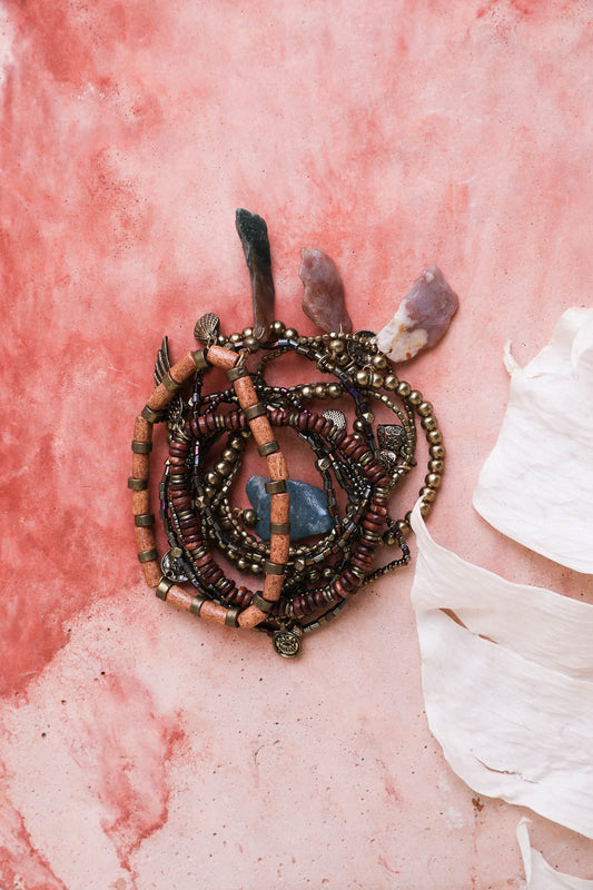 Boho stone and bead stack bracelet from Leto Collection featuring antique brass accents and natural stone elements.