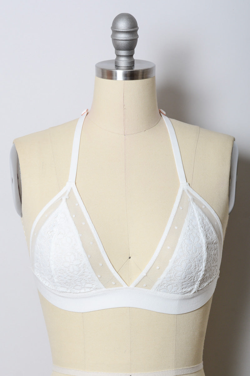 White crochet T-back bralette by Leto Collection featuring intricate crochet details and a comfortable T-back design.
