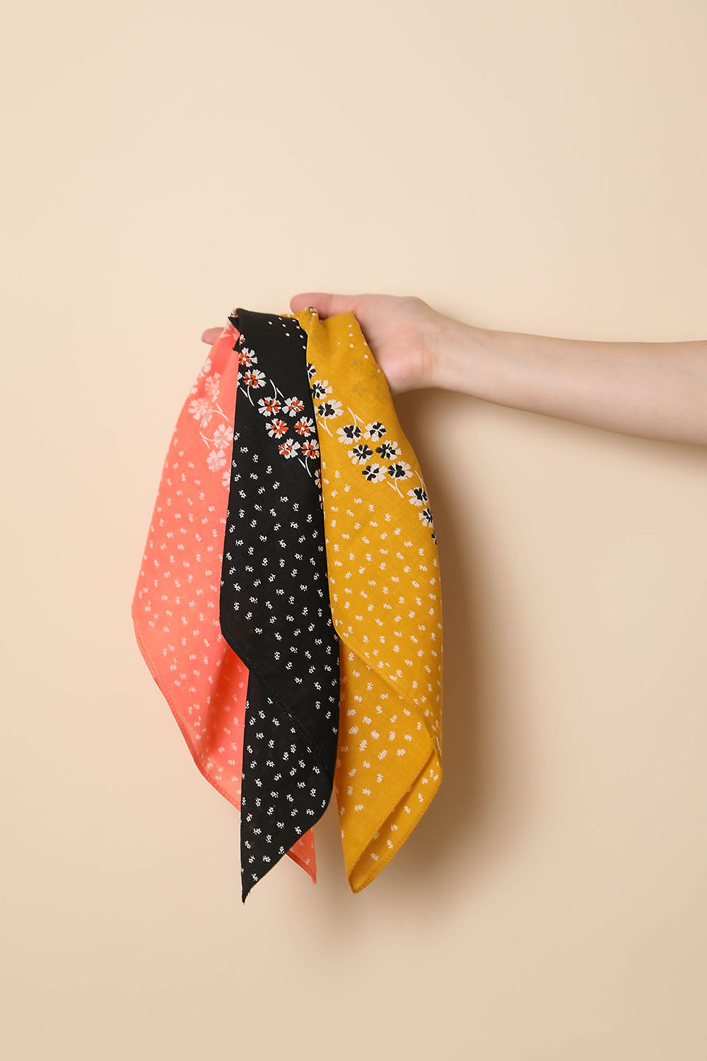 Leto Collection dotted and floral bandana with colorful patterns, made of lightweight fabric, styled as a versatile accessory.