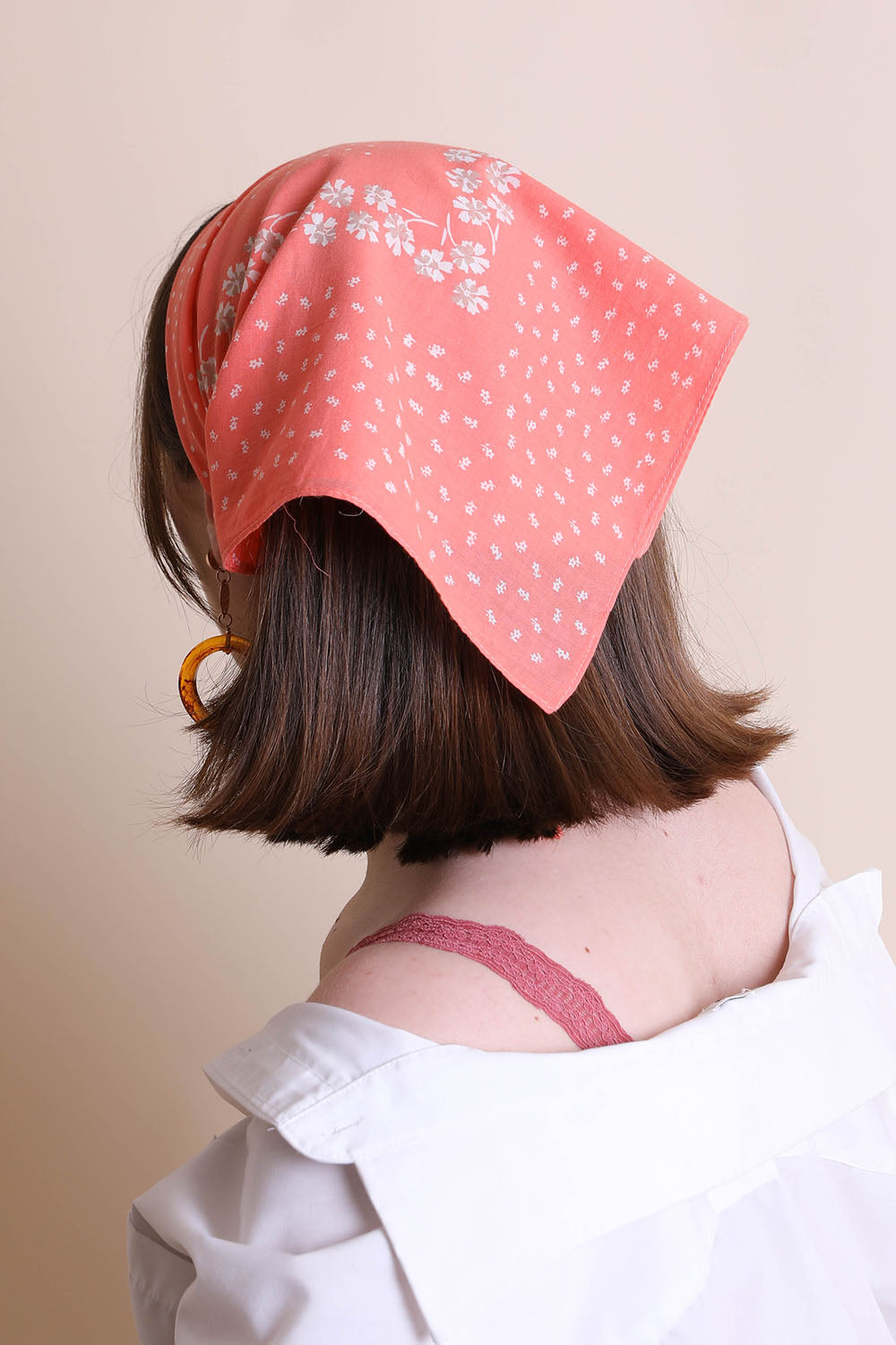 Leto Collection dotted and floral bandana with coral and white pattern, versatile accessory for pets or fashion styles