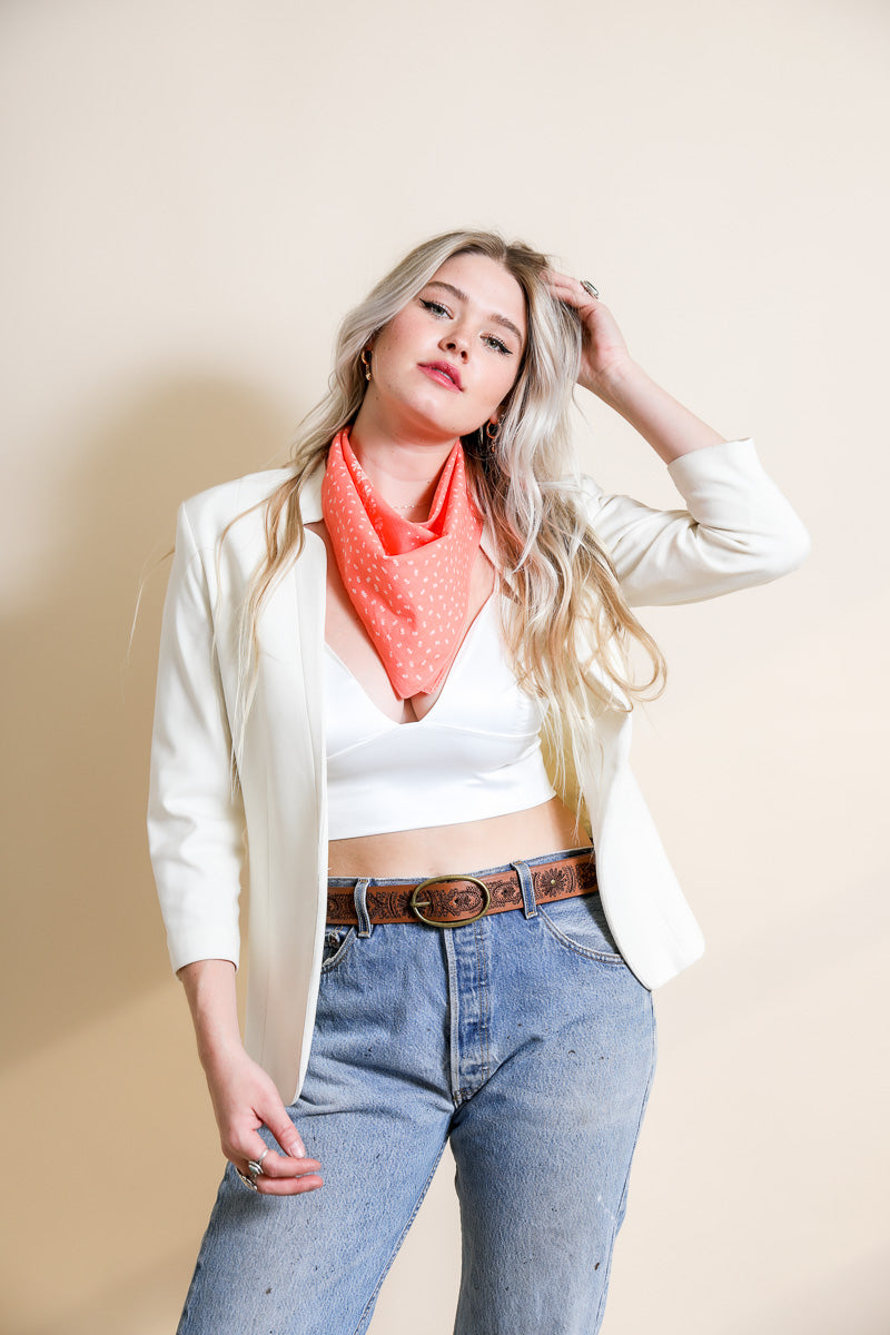 Leto Collection dotted and floral bandana with coral and red patterns, made of soft fabric, shown laid flat.