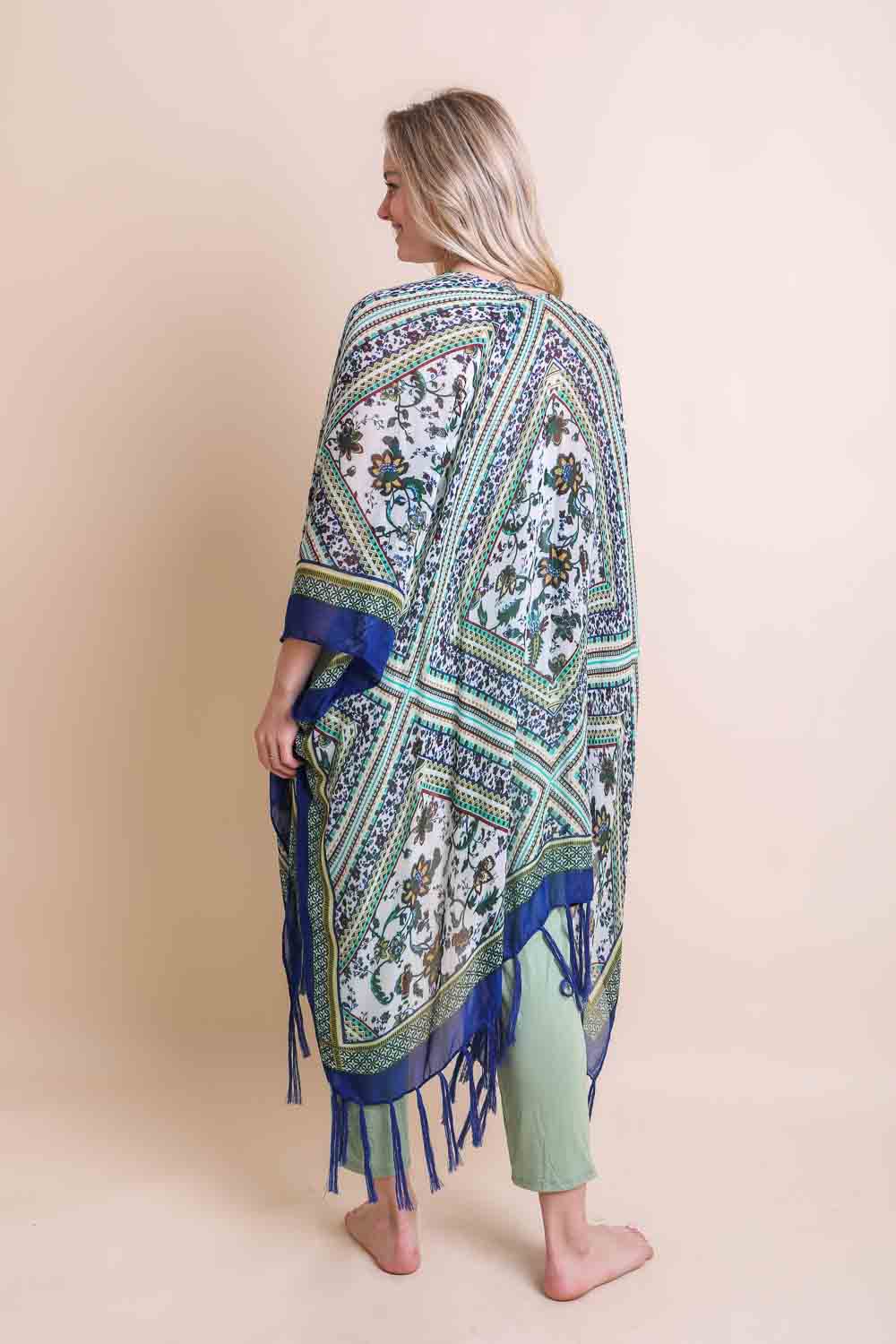 Blue bohemian diamond tassel kimono poncho by Leto Collection, featuring intricate patterns and flowing fabric.