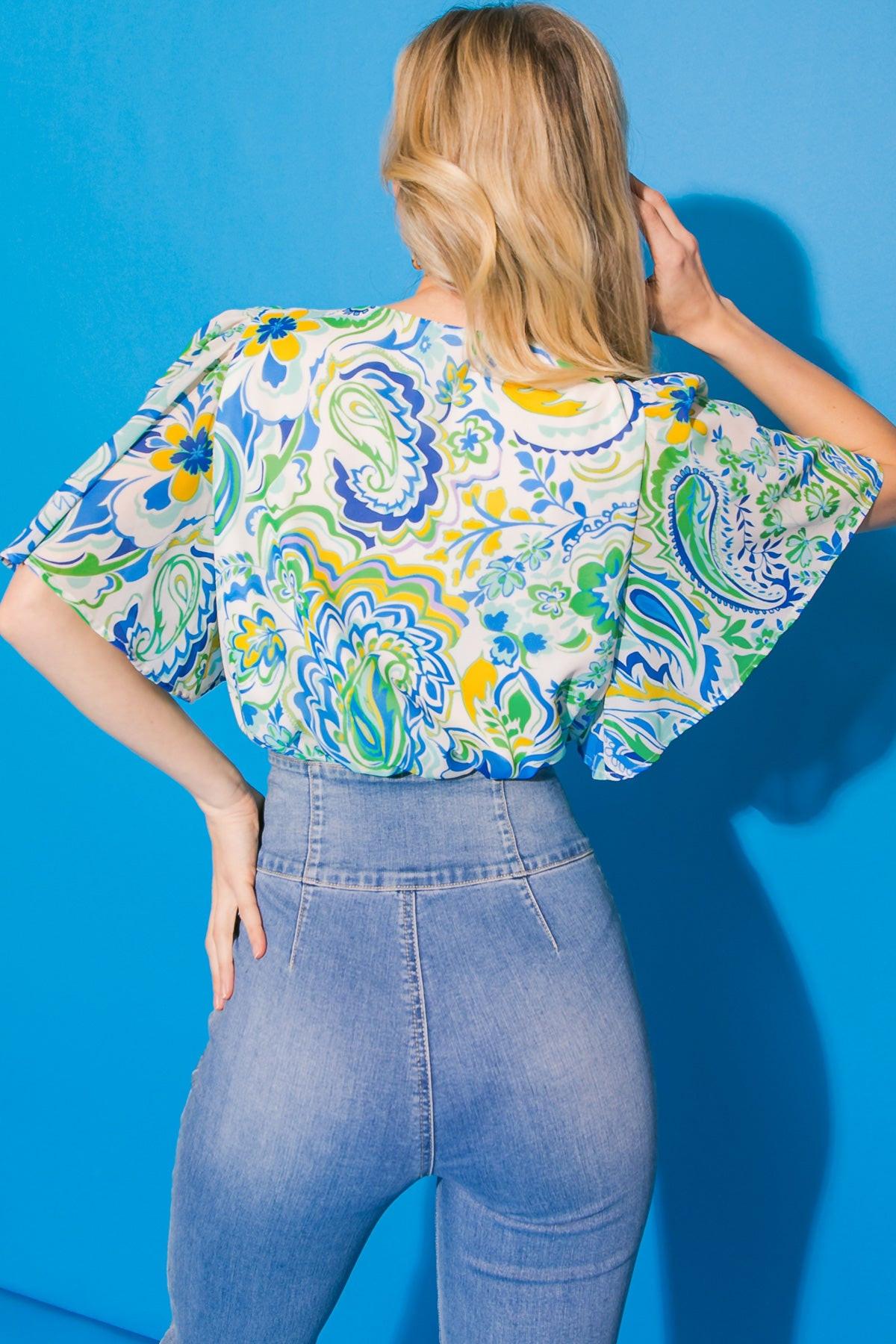 Fanciful Feat Printed Woven Bodysuit with Surplice Neckline and Flutter Sleeves in 20blu 20ivo19 — Soul Flow Apparel