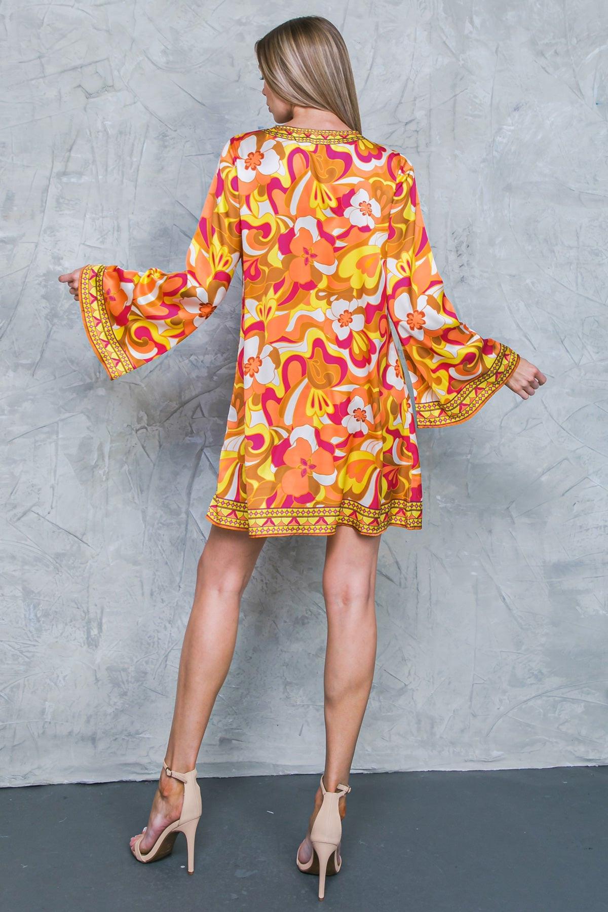 Caught Feelings Woven Mini Dress with V Neck Tie Tassel and Bell Sleeves — Soul Flow Apparel