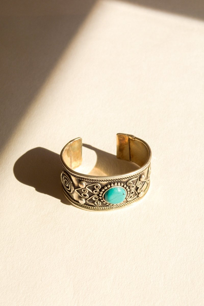 Leto Collection bohemian turquoise stone bangle featuring vibrant turquoise beads and intricate design for boho jewelry style.