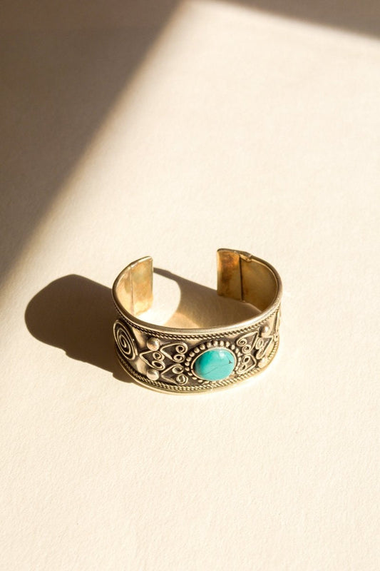 Leto Collection bohemian turquoise stone bangle featuring vibrant turquoise beads and intricate design for boho jewelry style.