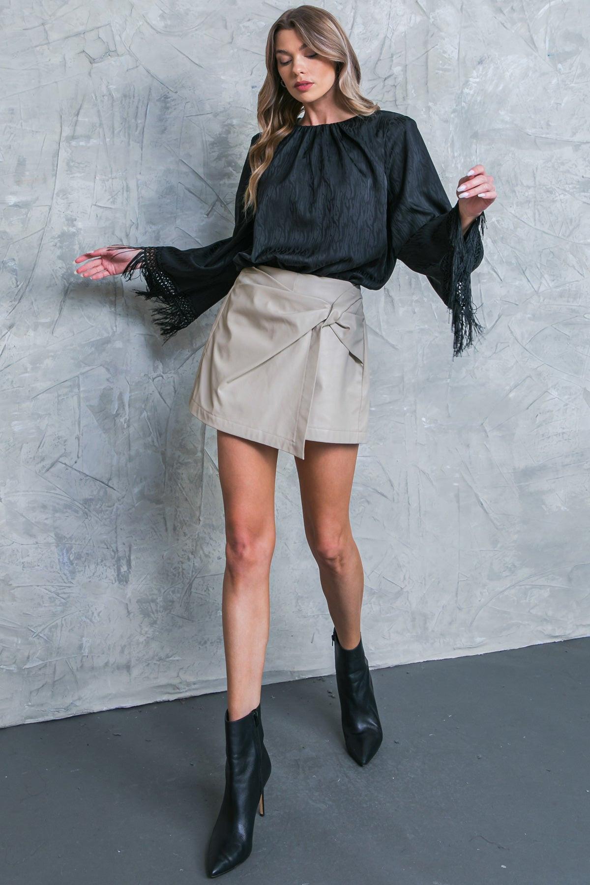 A Step Ahead Faux Leather Skort with Front Twist Detail and Back Zipper — Soul Flow Apparel
