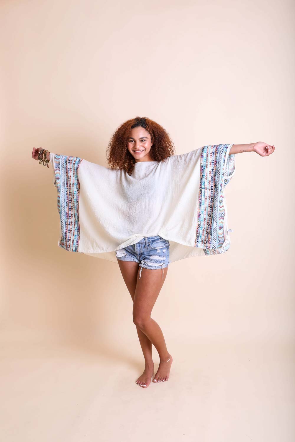 Leto Collection geometric embroidered kimono tunic with colorful patterns, lightweight fabric, and relaxed fit.