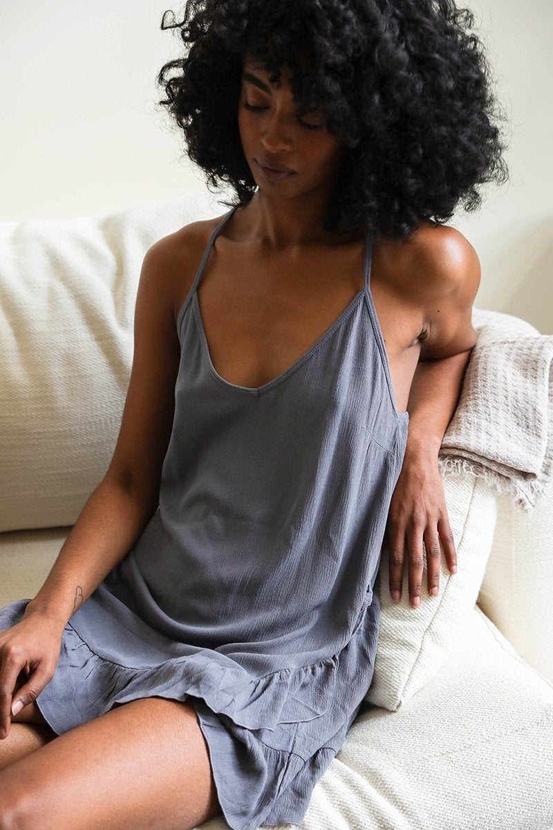 Leto Collection tattoo-back slip dress featuring a stylish design with a tattoo-inspired back detail on smooth fabric.